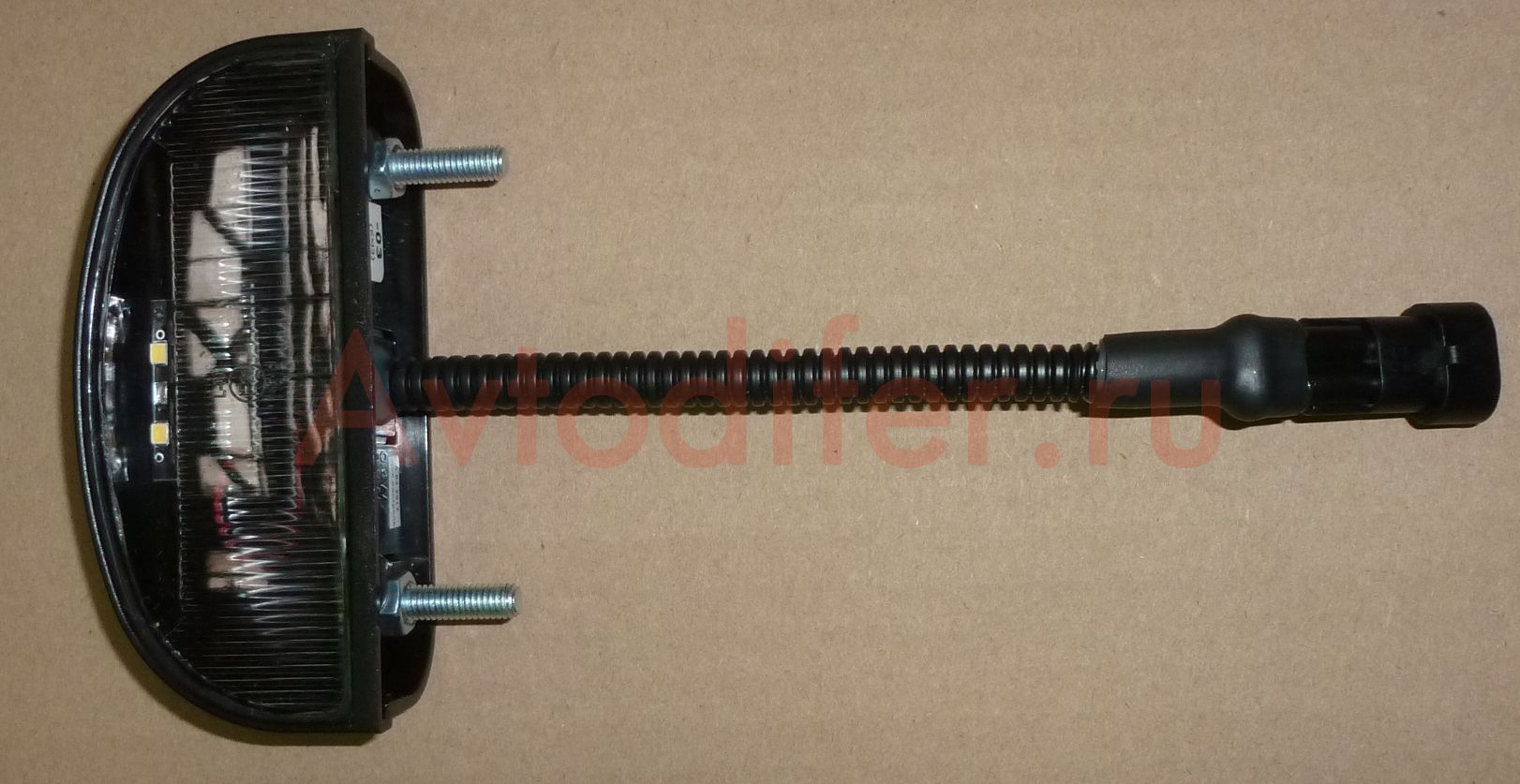 Фонарь освещения номерного знака